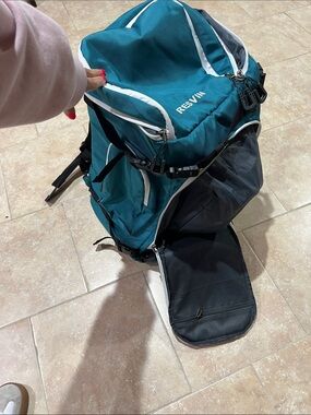 Teal Men's Travel Backpack with Multiple Compartments